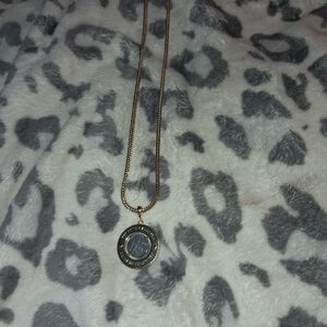 Elegant Gold and Silver Pendant Necklace